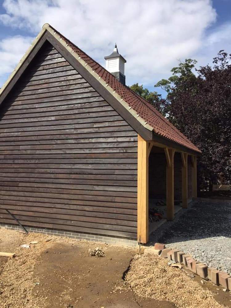 Ebonised oak feather edge cladding 